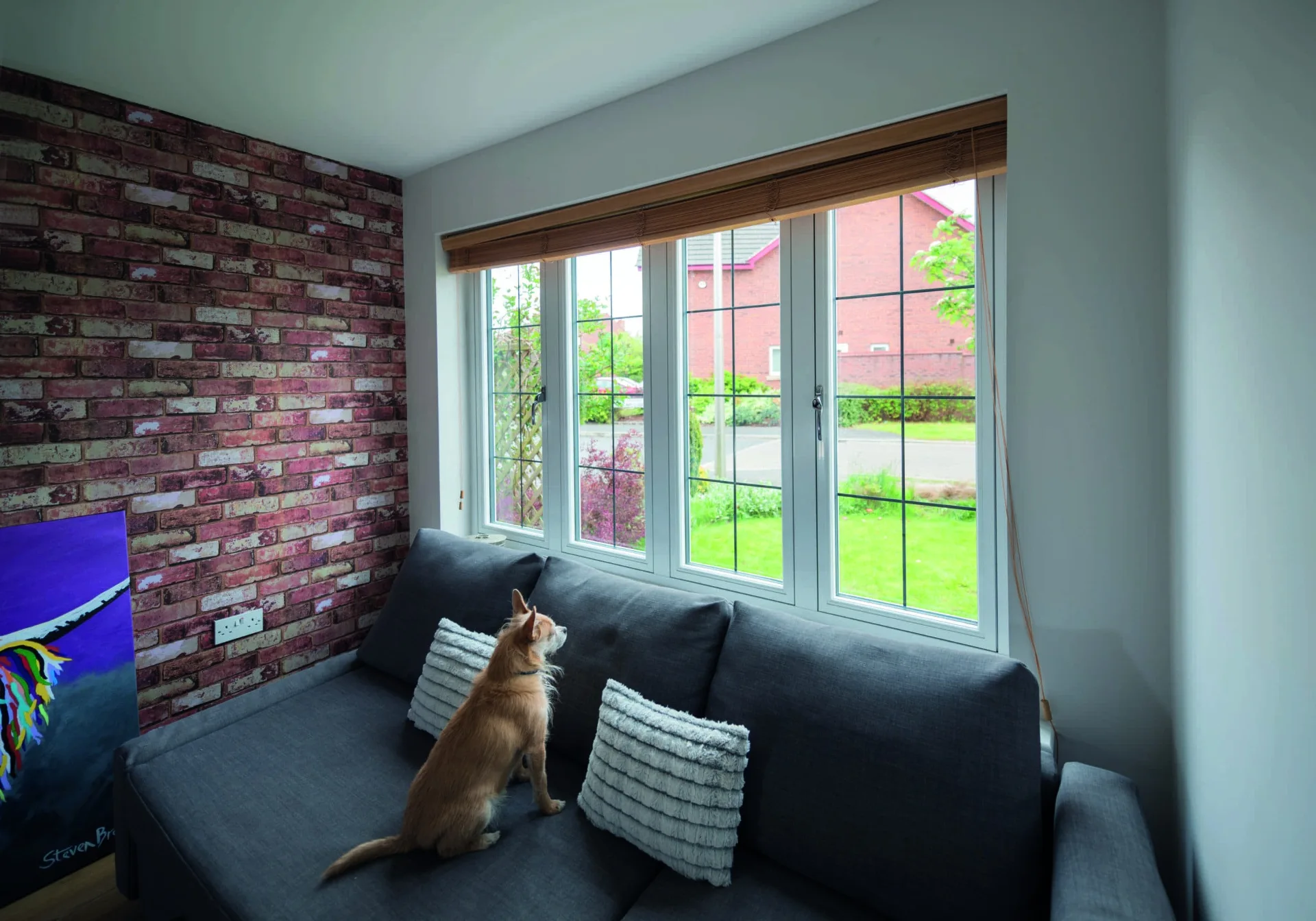 Living room interior with large casement windows
