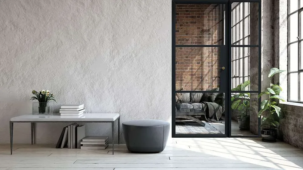 Industrial style interior with black frame glass partition