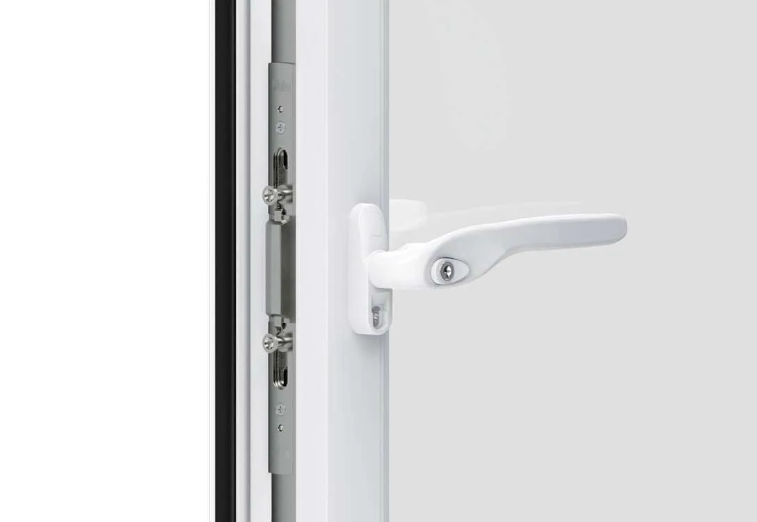 Close-up of casement window handle and locking mechanism