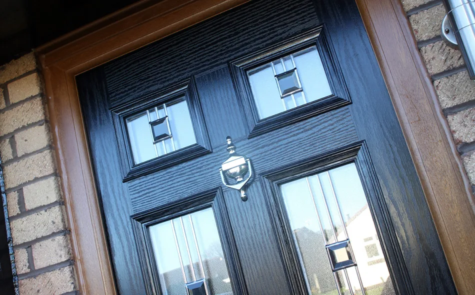Detailed view of composite door with decorative glass